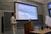 Jed Pizarro-Guevara presenting a slide